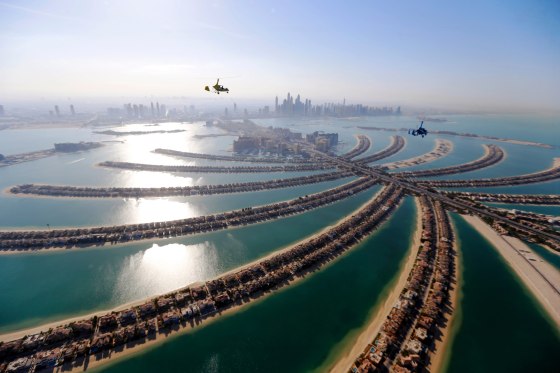 Image: Gyrocopters fly over Dubai