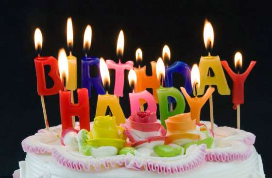 Image: Candles flicker on a birthday cake