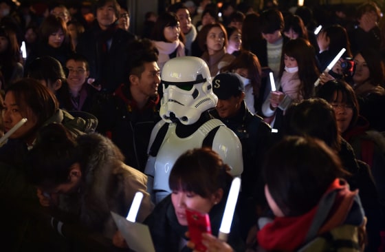 Image: A fan dressed as a Stormtrooper at a promotional event in Tokyo