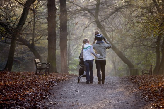 A family walking in the park.
