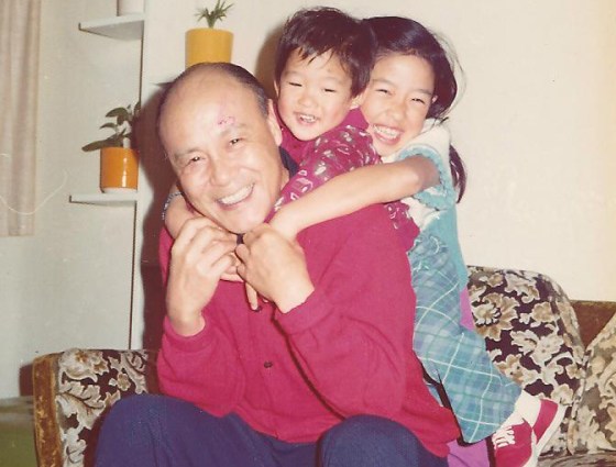 Frances Kai-Hwa Wang with her baby brother and maternal grandfather in California.