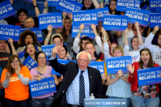 Image: U.S. Democratic presidential candidate Sanders waves to the crowd as he takes the stage at a campaign rally at Cornell College in Mount Vernon, Iowa