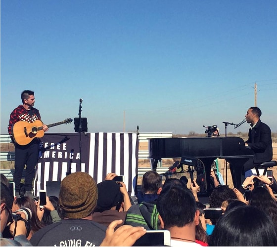 Juanes and John Legend performed outside of the Eloy Detention Center in Arizona.