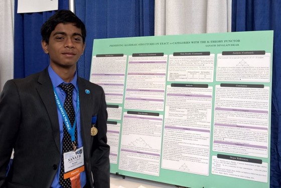 Sanath Devalapurkar presenting his project, "Preserving Algebraic Structures on Exact ∞-Categories with the K-Theory Functor," at the Intel International Science and Engineering Fair.