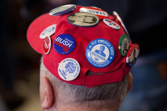 Image: A supporter attends a meeting with presidential candidate Jeb Bush
