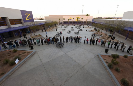 Image: Voters line up to vote at a local high school
