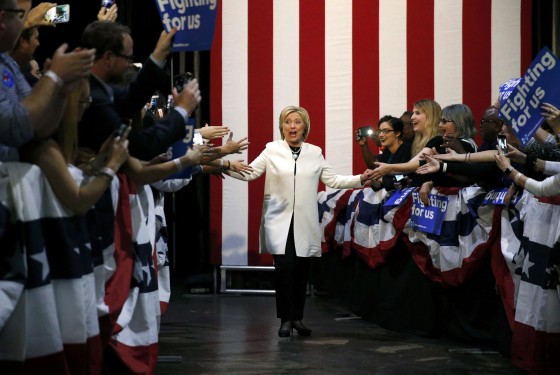 Image: Democratic U.S. presidential candidate Hillary Clinton greets supporters as she arrives at her Super Tuesday night party in Miami