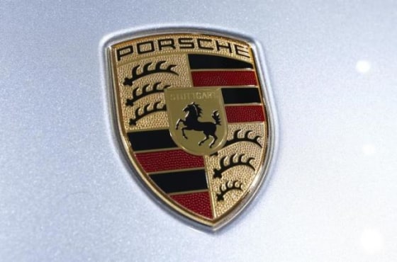 A logo is seen on a wheel of a Porsche car during the company's annual meeting in Stuttgard