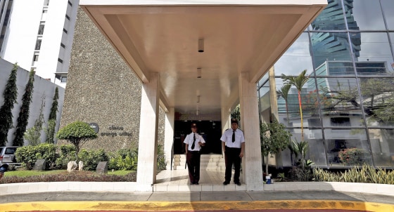 Image: Security guards are seen outside the Arango Orillac Building where the Mossack Fonseca law firm is situated at, in Panama City