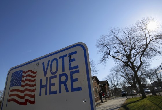 Image: A voter arrives to cast their ballot in the Wisconsin presidential primary election at a voting station in Milwaukee