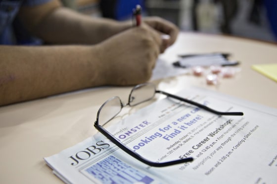 Image: A job seeker fills out an employment application