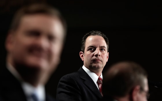 Image: Republican National Committee Chairman Reince Priebus (C) speaks