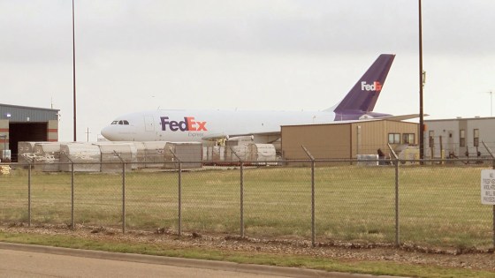 A stowaway taken into to custody by police at Lubbock Preston Smith International Airport has been identified as a Memphis FedEx airport ground crew employee who fell asleep on the plane before it took off for Lubbock.