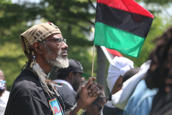 A veteran who calls himself The Nu World Warrior watches an annual ceremony honoring Malcolm X on what would be his 91st birthday.