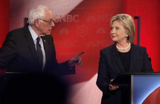 Image: Democratic U.S. presidential candidate Senator Sanders speaks directly to former Secretary of State Clinton as they discuss issues during the Democratic presidential candidates debate sponsored by MSNBC at the University of New Hampshire in Durham