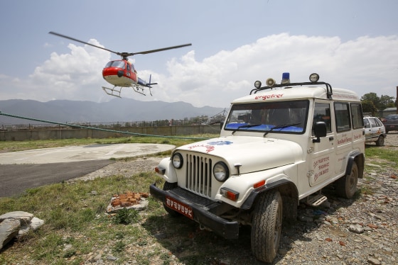 Image: The body of climber Eric Arnold arrives in Kathmandu