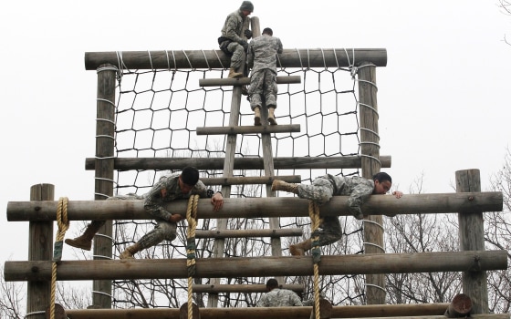 U.S. Army soldiers negotiate an obstacle structure during an Air Assault training course at a U.S. Army base in Dongducheon, South Korea, in 2013.