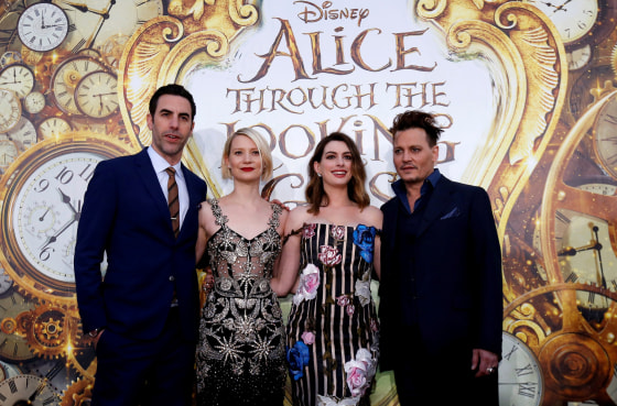 Image: Cast members Cohen, Wasikowska, Hathaway and Depp pose at the premiere of "Alice Through the Looking Glass" at El Capitan theatre in Hollywood