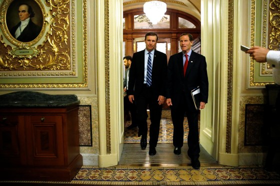 Image: Murphy and Blumenthal depart the Senate floor directly after ending a 14-hour filibuster in the hopes of pressuring the U.S. Senate to action on gun control measures, at the U.S. Capitol in Washington