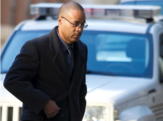 Image: Caesar Goodson arrives at the courthouse for the first day of jury selection in Baltimore Maryland