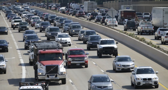 Drivers work their way out of Dallas during rush hour on July 1, 2016. As more travelers are driving, traffic deaths surged last year as drivers racked up more miles behind the wheel than ever before, a result of an improved economy and lower gas prices, according to preliminary government data released.