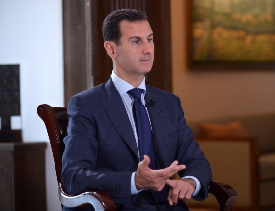 Image: Syrian President Bashar al-Assad speaking during an interview with American NBC News channel in the capital Damascus
