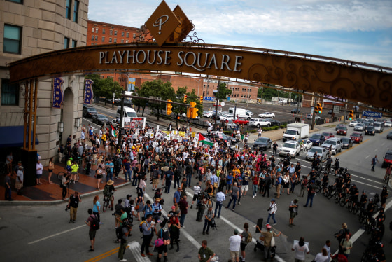 Image: Police use bicycles to create cordons around protesters ahead of Republican National Convention in Cleveland, Ohio