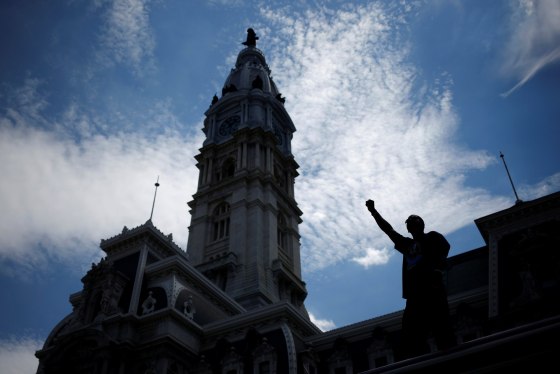 Image: A supporter of Bernie Sanders shouts "Bernie or Bust" ahead of the 2016 Democratic National Convention in Philadelphia, Pennsylvania
