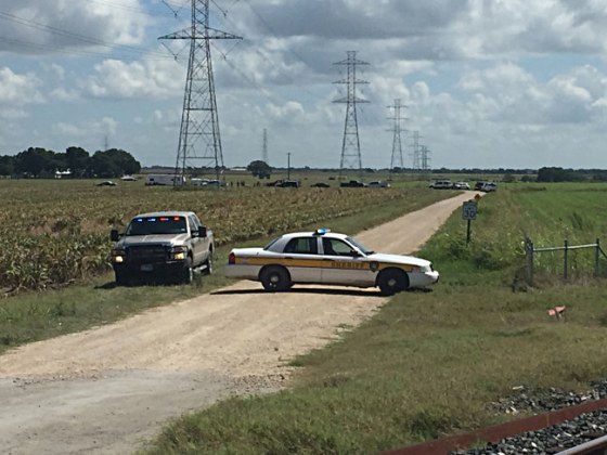 Police respond at the scene of a balloon crash in Lockhart, Texas.