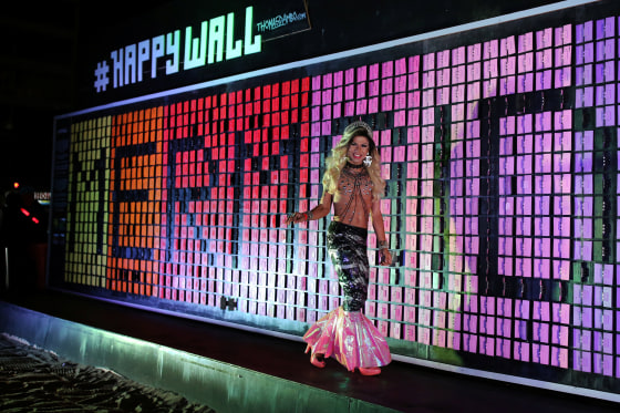 A participant walks the runway during a mermaid competition at Ipanema beach.