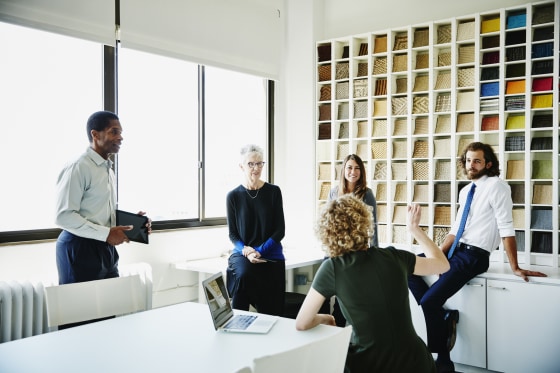 Businesswoman leading informal meeting