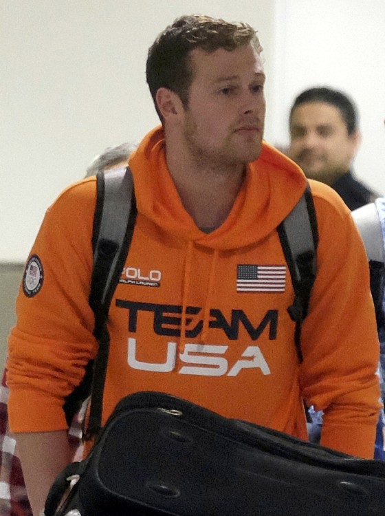 Image: U.S. Swimmers Jack Conger and Gunnar Bentz arrive on an overnight flight from Brazil to Miami in Miami