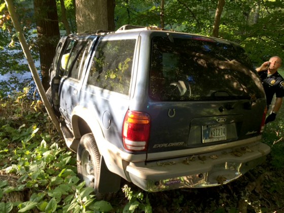 This photo released by Indiana State Police shows the vehicle that crashed in Indiana Saturday, Sept. 17, 2016, killing one person and leaving another man trapped inside.