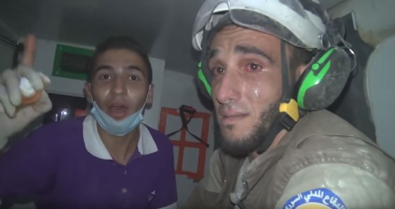 Image: A White Helmets volunteer breaks down in tears after an hours-long operation to rescue a baby in the Idlib province in Syria