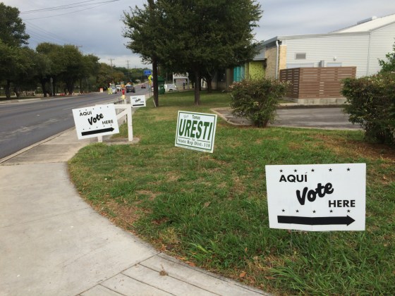 Jessica Azua talks to Lucinda Sanchez,77 and Pablo Sanchez, 79, while their grandson Steven Sanchez, 27, looks on. Azua was knocking on doors of homes of Latinos in south San Antonio to talk to them about voting, even though she has DACA and can't vote.
