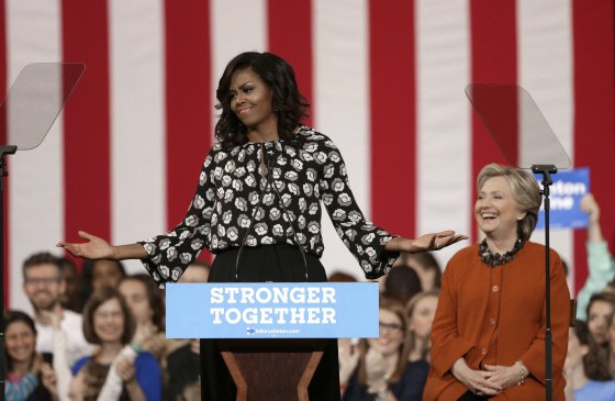 Clinton Cedes Spotlight to Fellow First Lady Michelle Obama