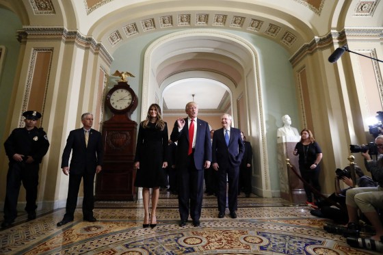 Image: Donald Trump, Melania Turmp, Mitch McConnell