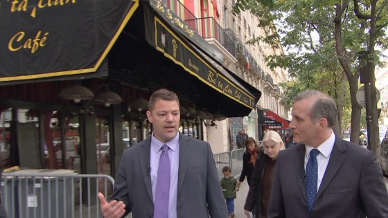 Jonathan Dienst of NBC News (right) outside the Bataclan nightclub in Paris, which has reopened a year after a deadly terror attack, with an NYPD detective.
