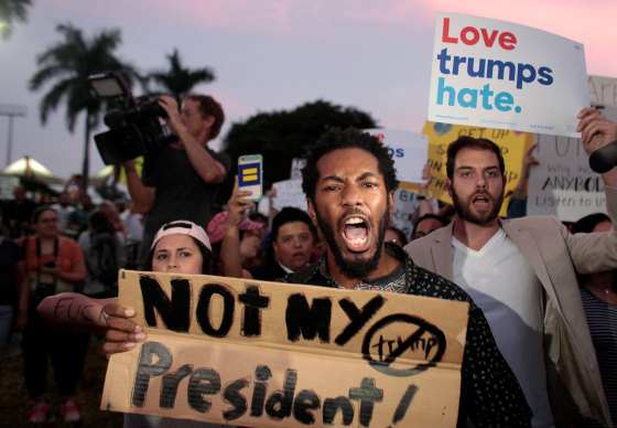 Image: People protest against U.S. President-elect Donald Trump in Miami