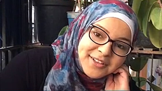 Image: Zein records her video diary in eastern Aleppo