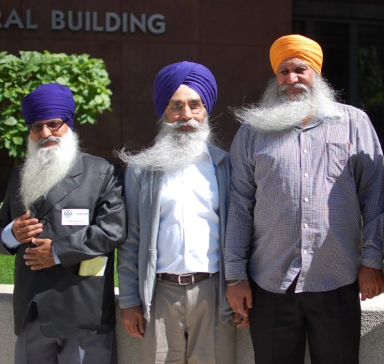 After a seven-year federal investigation, four Sikh-American truck drivers have reached a landmark settlement agreement with one of America's largest trucking companies, J.B. Hunt, for religious discrimination.