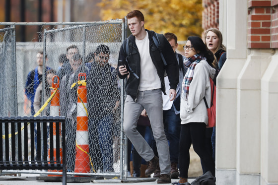 Image: Students leave buildings as police respond to an attack on campus at Ohio State University
