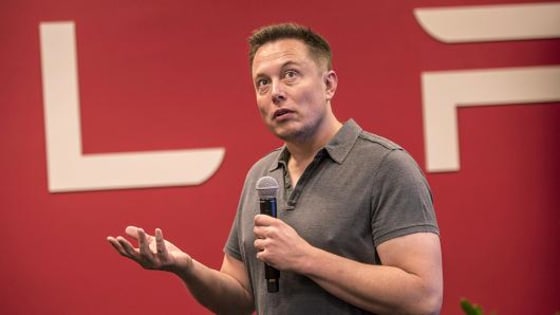 Elon Musk, chairman and chief executive officer of Tesla Motors, speaks during an event at the company's headquarters in Palo Alto, California.