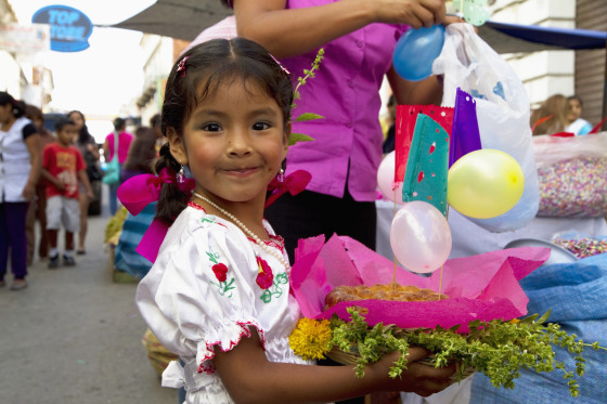 Girl Carrying A Gift Basket