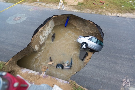 Massive Texas Sinkhole Swallows Two Cars Killing Sheriff s Deputy