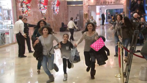 Visitors to Trump Tower run during an evacuation by the New York Police Department, Dec. 27. The suspicious bag that prompted it was later found to contain children's toys.