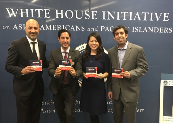 Sammy Chand, Maulik Pancholy, Rebecca Lee, and Raoul Juneja with the "#ActToChange" album at the Fast Forward 2060 event.