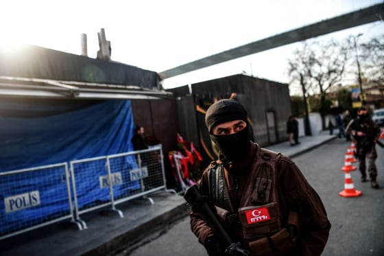 Image: A Turkish special force police officer walks in front of the Reina nightclub