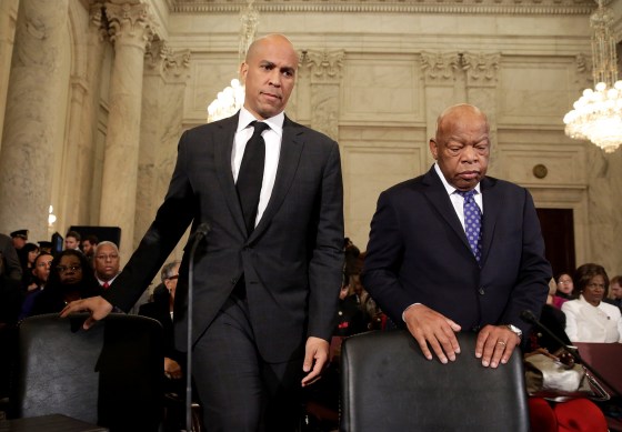 Image: Senator Booker and Rep. Lewis arrive to testify to the Senate Judiciary Committee during the second day of confirmation hearings on Senator Sessions' nomination to be U.S. attorney general in Washington.
