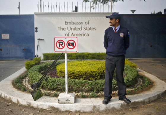 Image: A private security guard stands outside the U.S. embassy in New Delhi December 18, 2013.